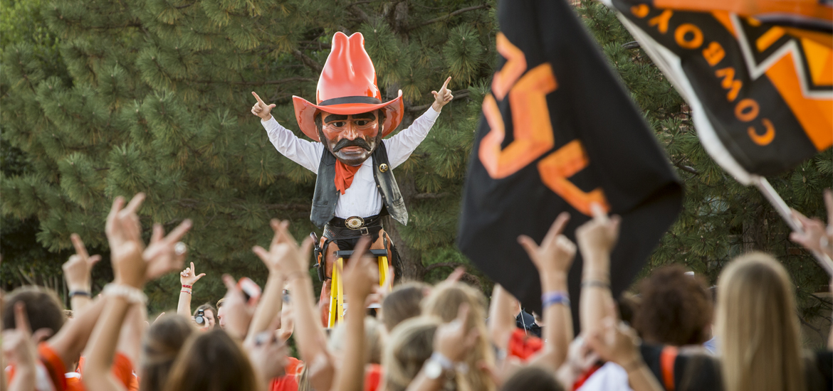 Pistol Pete and students show off their orange pride.