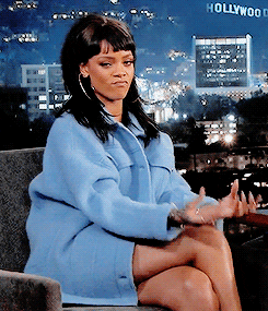 GIF of Rihanna making a "show me the money" gesture