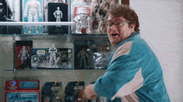 GIF of Bobby Moynihan giving a thumbs up and saying, "Awesome!"