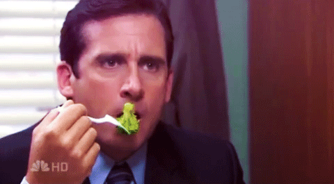 gif of a person eating broccoli