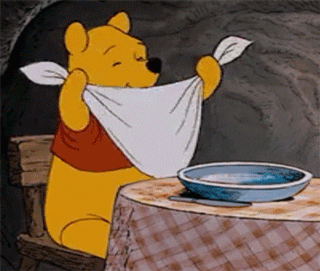GIF of winnie the pooh eating dinner