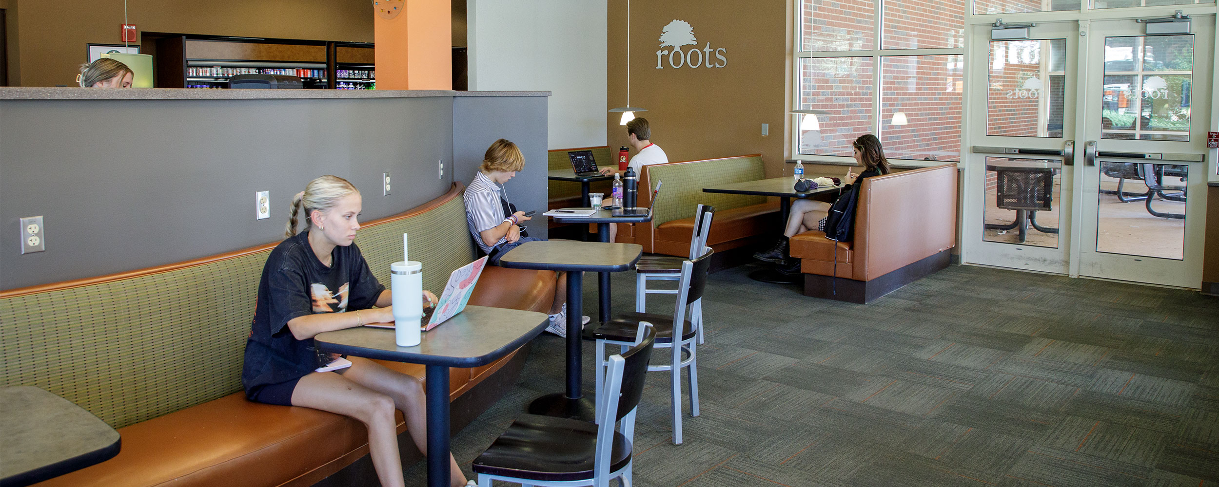 Students sitting in Roots the coffee shop at OSU Students sitting in Roots the coffee shop at OSU